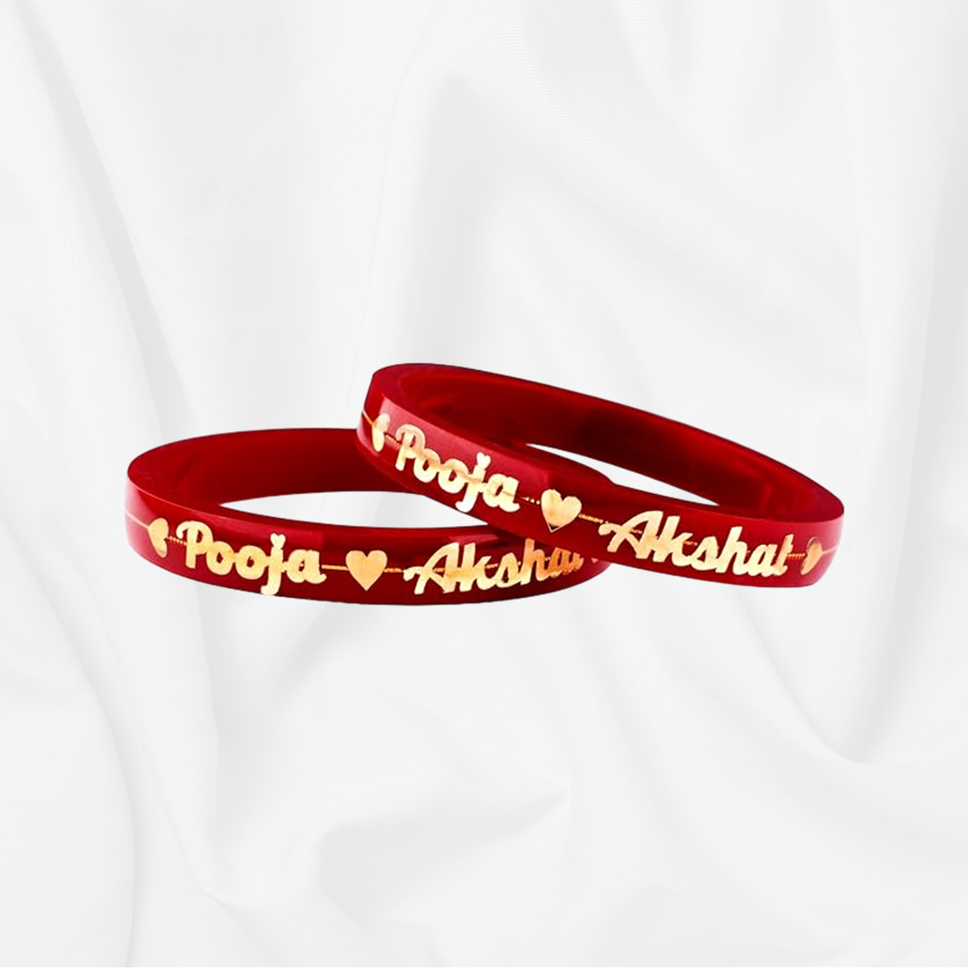 Customized Personalised Bangles With Name: Handcrafted 22kt gold bangles featuring laminated red base, gold text, and durable design, ideal for daily wear and gifting.